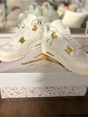 Jordan White and Gold Air Jordan 4 Sneakers